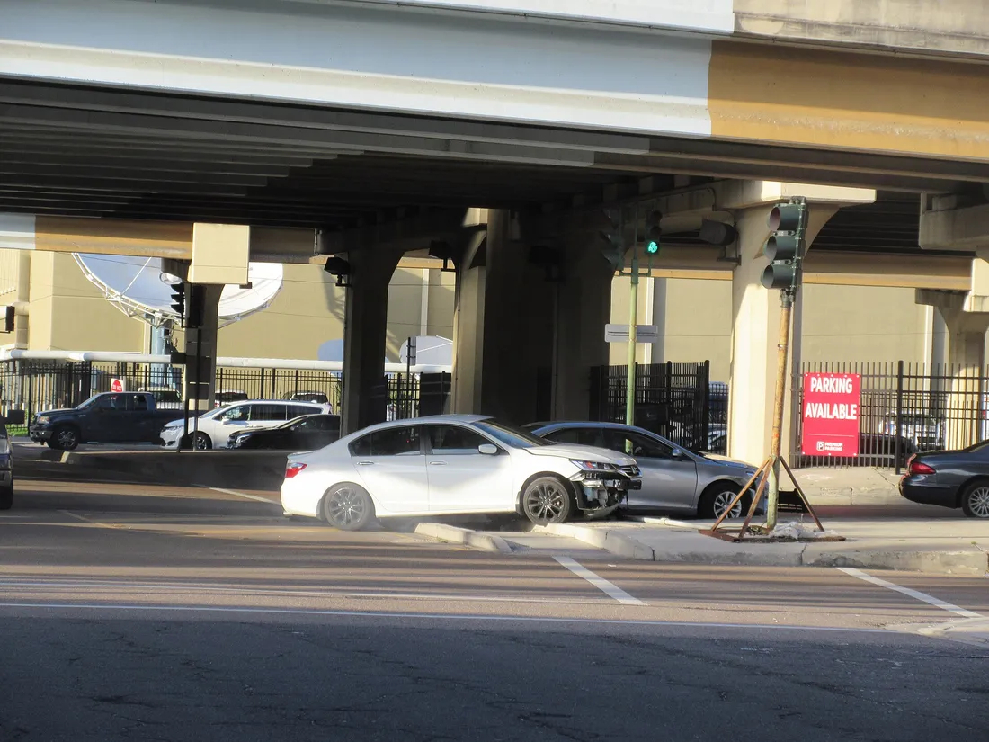 Damaged car after a collision on a Houston street